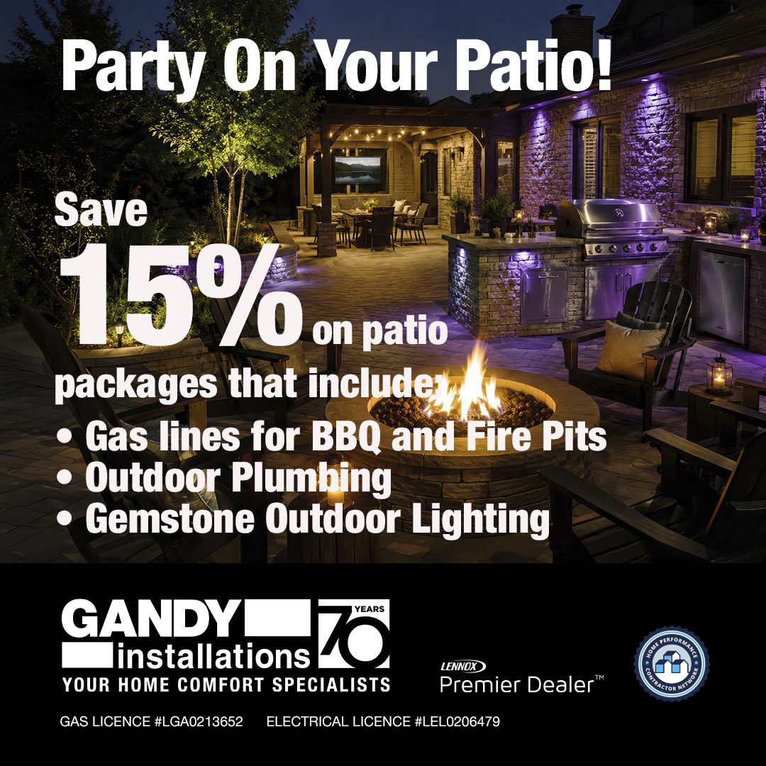 A cozy, well-lit patio at dusk featuring a dining area, plush seating, and a fire pit. Text advertises a 15% discount on patio packages from Gandy Installations, highlighting gas lines, plumbing, and lighting services.